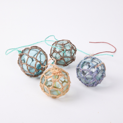 A Collection Of Four Japanese Glass Fishing Floats