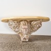 A Large French Carved Cherub Head Shelve