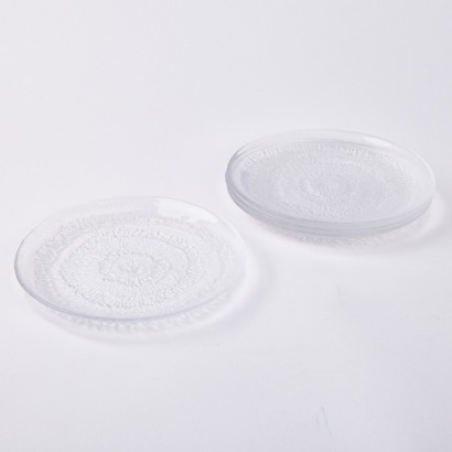 A Set of Four Tapio Wirkkala Solaris Side Plates for Iittala