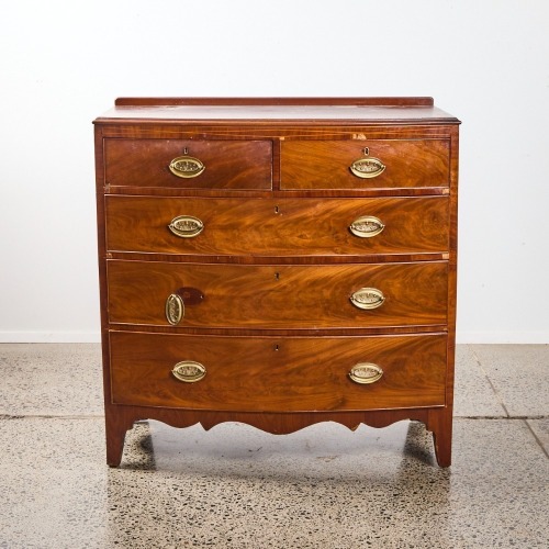 An Antique Bow-front Chest of Drawers