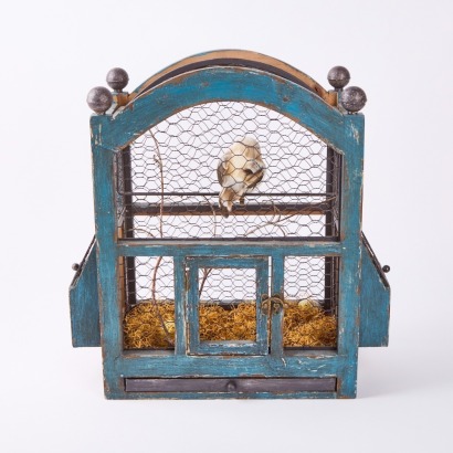 An Unusual Cage with Faux Bird inside