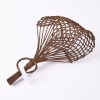 A Hand Woven Rattan Core Onion Basket