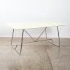 A Calligaris Dining Table With White Top & Chrome Base