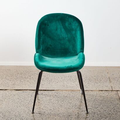 A Single Modern Green Velour Chair