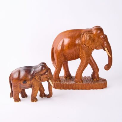 A Pair of Teak Carved Elephants