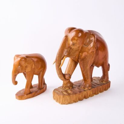 A Pair of Teak Carved Elephants