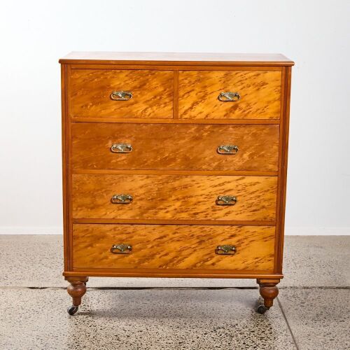 A Mottled Kauri Scotch Chest On Turned Feet With Wheels