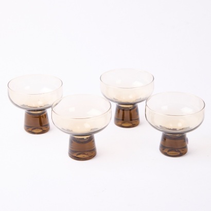 A Set of Four Kaaru Glass Champagne Coups