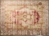 A Large Worn Out Hand Knotted Turkish Rug