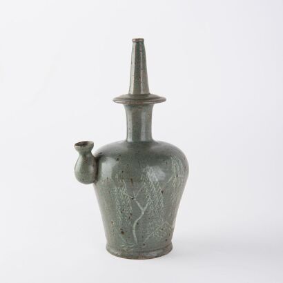 A Korean 18th century celadon handled pot