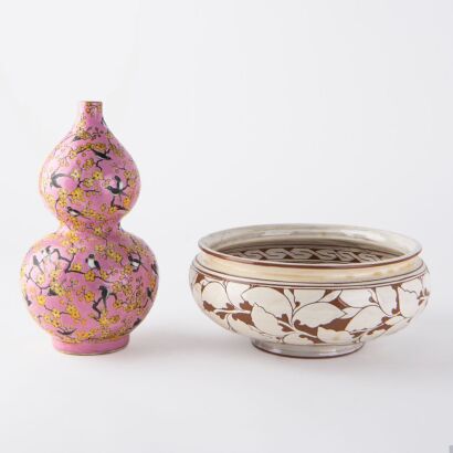 A Korean engraved port and A Chinese famille-rose enamelled 'birds and flowers'gourd vase (Qing dynasty, Qianlong mark)