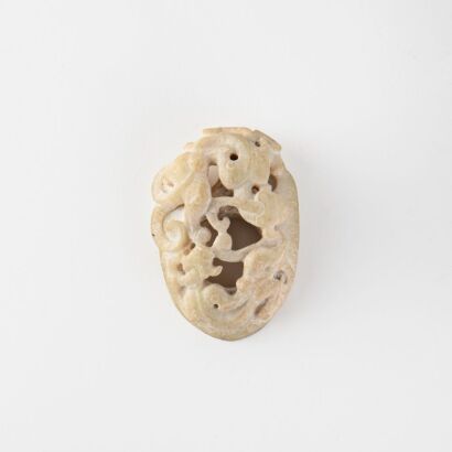 A Chinese archaistic jade 'chilong' heart shaped pendant