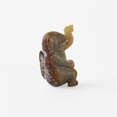 A Chinese archaistic jade 'figure' pendant