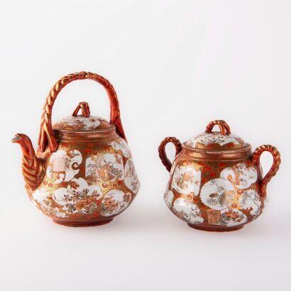 Two Japanese early 20th century Kutani-yaki 'figure and flower' teapots