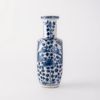 A Chinese Qing dynasty blue and white 'dragon' rouleau vase