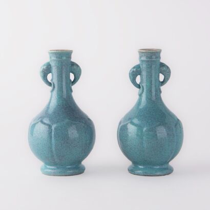 A pair of Chinese Qing dynasty Jun ware handled vases