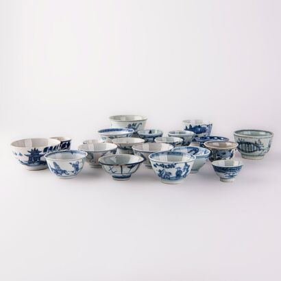 A group of twenty-one Chinese Qing dynasty blue and white small cups