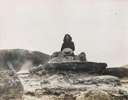 Photographer Unknown - Untitled (woman sitting on rock)