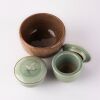 A Japanese green glazed tealight and Two Korea celadon teacups