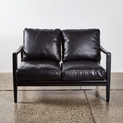 A Cabana Buckle Back Leather Sofa with Ebonised American Ash Frame