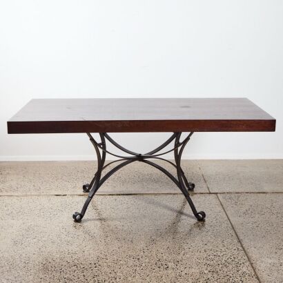 An Industrial Table with Rimu Top & Wrought Iron Base