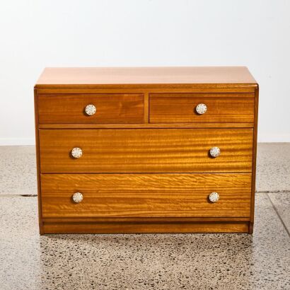 A Mid-Century Mahogany Chest Of Drawers