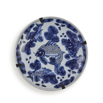 An Early 19th Century Blue and White Plate decorated with fish and water plant pattern