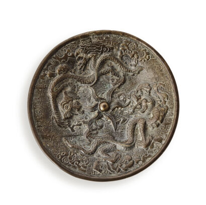 A Chinese Ming Dynasty Copper Plate decorated with a pair of dragons