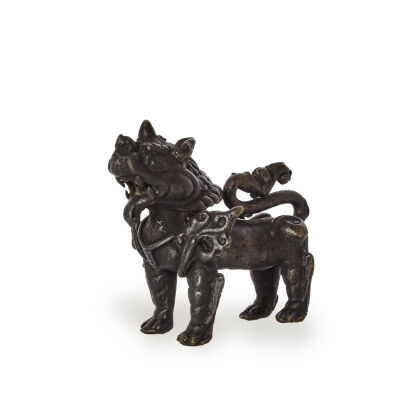 A 19th Century Bhutan Bronze Beast Ornaments