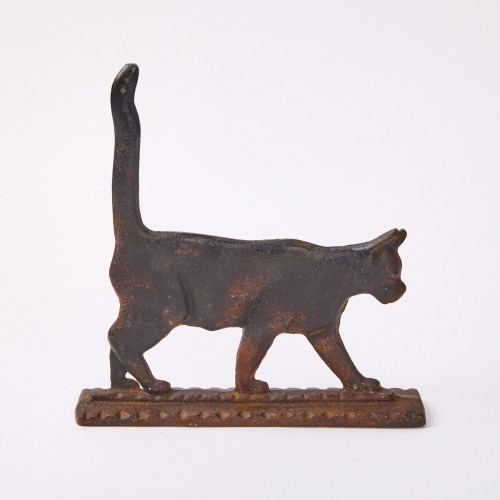 A Cast Iron Black Cat Doorstop