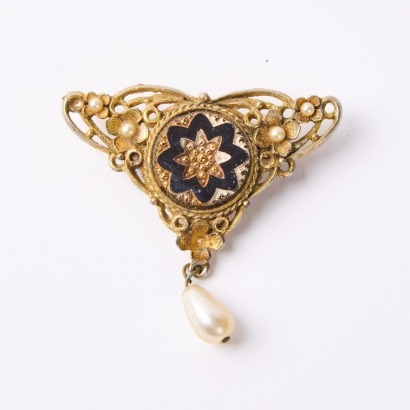 A Victorian Onyx and Seed Pearl Filigree Brooch