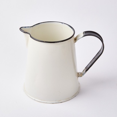 A Large White Enamel Jug