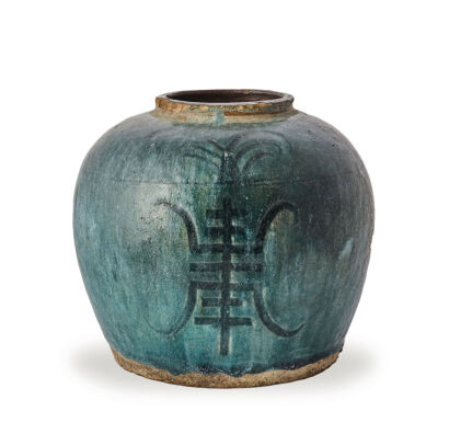 A Chinese Han/Tang Dynasty Green Glazed Jar decorated with longevity characters