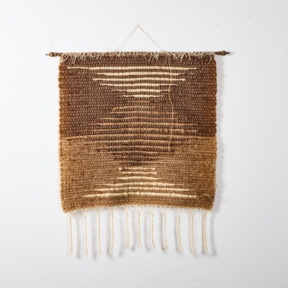A Hand Woven Natural Wool Wall Hanging
