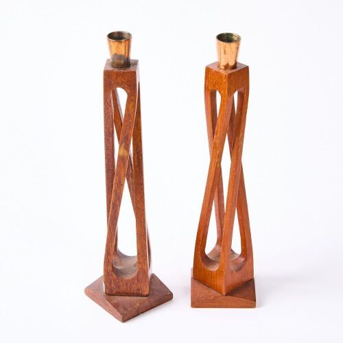 A Pair of Modernist Sculpted Candlesticks