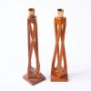 A Pair of Modernist Sculpted Candlesticks
