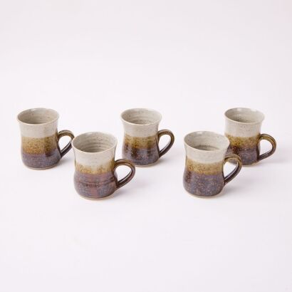 A Set Of Five Glazed Studio Pottery Cups
