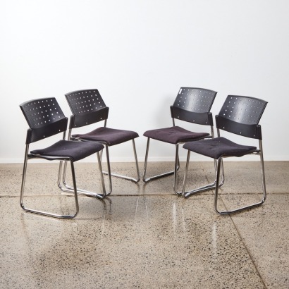 A Set of Four Office Chairs