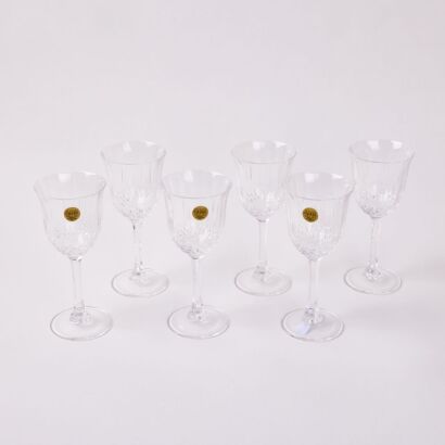 A Set Of Six Cut Crystal Wine Glasses