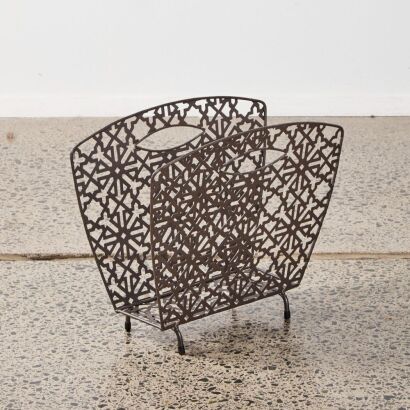 A Modern Metal Magazine Holder