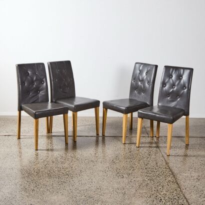 A Suite of Four Button Back Dining Chairs