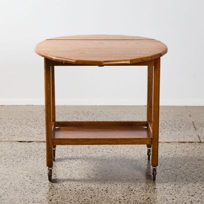 An Art Deco Solid Oak Drop Leaf Drinks Trolley