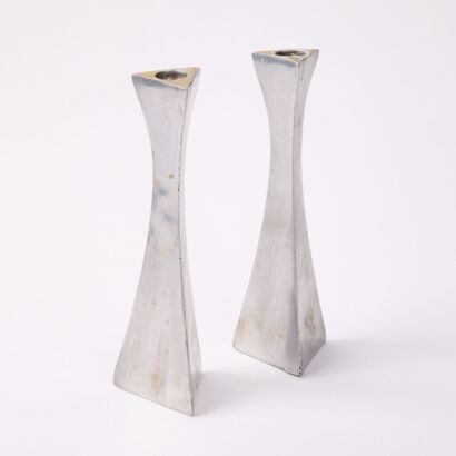 A Pair Of Pewter Candle Holders