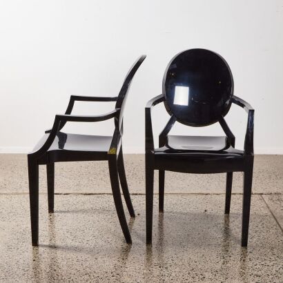 A Pair Of Kartell Ghost Chairs