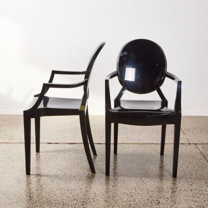 A Pair Of Kartell Ghost Chairs