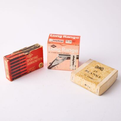 Three Empty Vintage Gun Cartridge Packaging