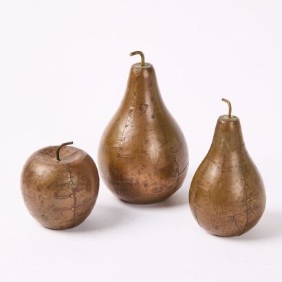 A Set of Three Arts and Crafts Copper Fruit