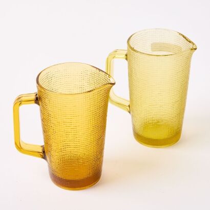 A Pair of Amber Coloured Glass Jugs