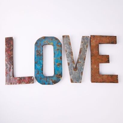 A Set Metal Letters Spelling LOVE
