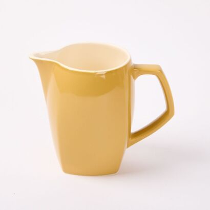 A Crown Lynn Mustard Glaze Milk Jug